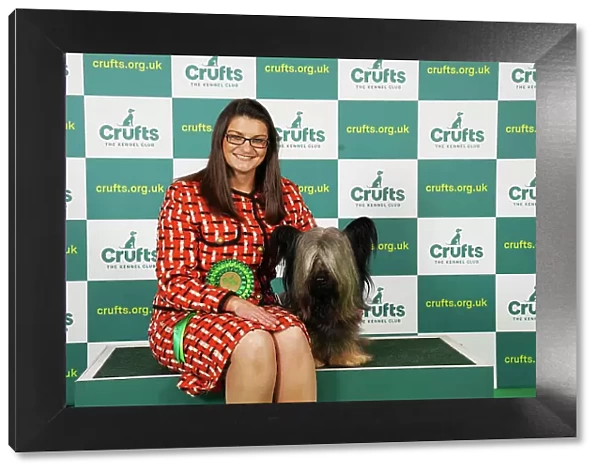Kirsty Ryan from Lutterworth with Fergal, a Skye Terrier, which was the Best of Breed winner today (Saturday 11. 03. 23), the third day of Crufts 2023, at the NEC Birmingham