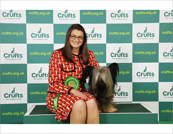 Kirsty Ryan from Lutterworth with Fergal, a Skye Terrier, which was the Best of Breed winner today (Saturday 11. 03. 23), the third day of Crufts 2023, at the NEC Birmingham