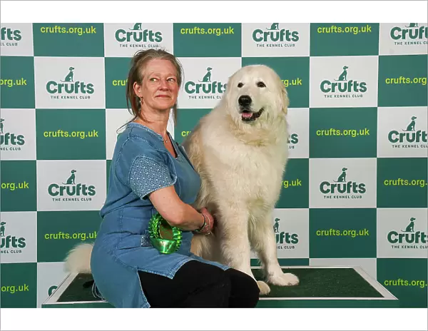 Jane Atkins from Carlisle with Saf, a Maremma Sheepdog, which was the Best of Breed winner today (Friday 10. 03. 23), the second day of Crufts 2023, at the NEC Birmingham