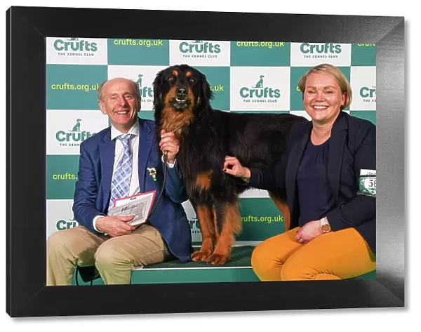 Michael Murphy and Heli Mooney from Kildare with Beamish, a Hovawart, which was the Best of Breed winner today (Friday 10. 03. 23), the second day of Crufts 2023, at the NEC Birmingham