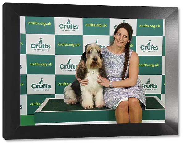 Anouk Muikesmoven from The Netherlands with Getme, a Basset Griffon Vendeen (Grand), which was the Best of Breed winner today (Saturday 11. 03. 23), the third day of Crufts 2023, at the NEC Birmingham