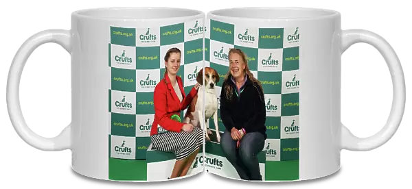Alysha Branchflower and Charlotte Farrar from Bridgewater with Havoc, a Harrier, which was the Best of Breed winner today (Saturday 11. 03. 23), the third day of Crufts 2023, at the NEC Birmingham