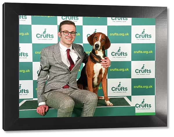 Reagan Graham from Cumbria with Larsson, a Hamiltonstovare, which was the Best of Breed winner today (Saturday 11. 03. 23), the third day of Crufts 2023, at the NEC Birmingham
