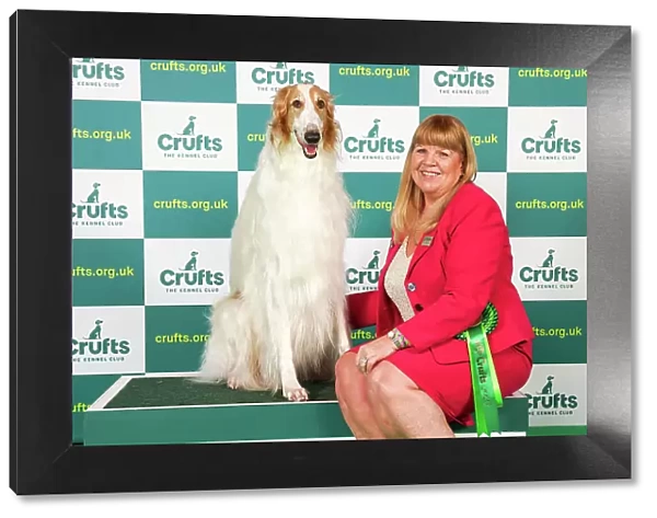 Sue Pinkerton from Exeter with Rory, a Borzoi, which was the Best of Breed winner today (Saturday 11. 03. 23), the third day of Crufts 2023, at the NEC Birmingham