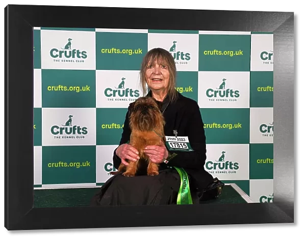 Joan Martyn, from Stockbridge, with Arthur, a Griffon Bruxellois, which was the Best of Breed winner today (Sunday 12. 03. 23), the last day of Crufts 2023, at the NEC Birmingham