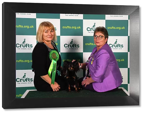 Amanda Orchard and Iveta Holyland from Romsey, with Pride, a Russian Toy, which was the Best of Breed winner today (Sunday 12. 03. 23), the last day of Crufts 2023, at the NEC Birmingham