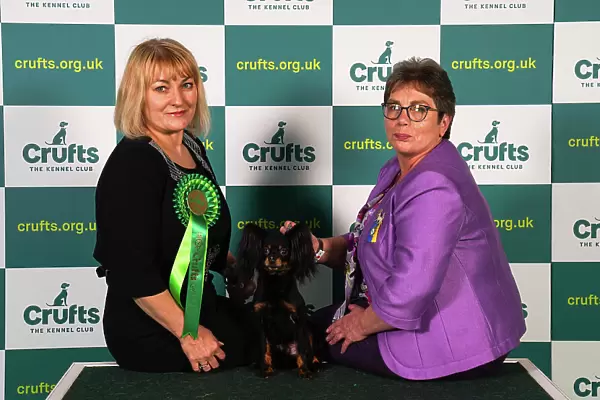 Amanda Orchard and Iveta Holyland from Romsey, with Pride, a Russian Toy, which was the Best of Breed winner today (Sunday 12. 03. 23), the last day of Crufts 2023, at the NEC Birmingham