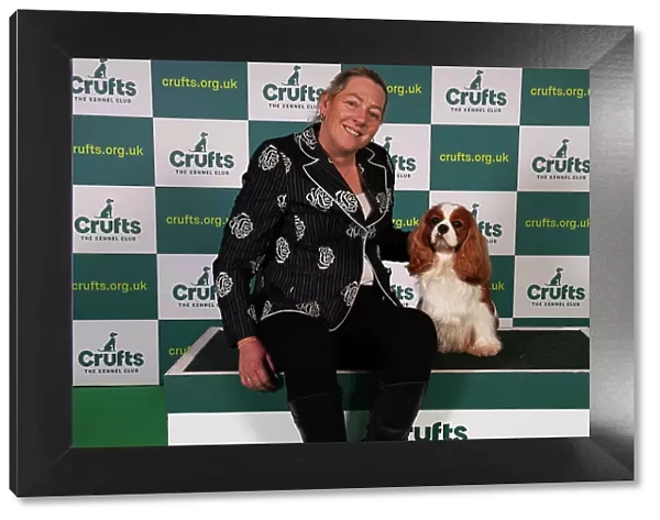 Tanya Ireland from Essex, with Dublin, a Cavalier King Charles Spaniel, which was the Best of Breed winner today (Sunday 12. 03. 23), the last day of Crufts 2023, at the NEC Birmingham