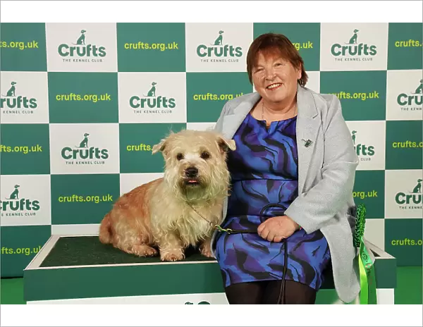Marie McNally from Wexford with Karma, a Glen of Imaal Terrier, which was the Best of Breed winner today (Saturday 11. 03. 23), the third day of Crufts 2023, at the NEC Birmingham