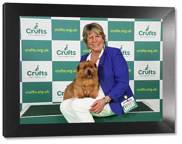 Ruth Gee from Worksop with Boozy, a Norfolk Terrier, which was the Best of Breed winner today (Saturday 11. 03. 23), the third day of Crufts 2023, at the NEC Birmingham