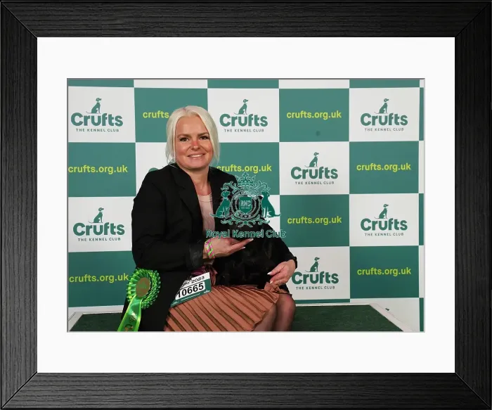 Framed Print : Catrine Arntzen from Norway with Lea, a Staffordshire Bull Terrier, which was the Best of Breed winner today (Saturday 11. 03. 23), the third day of Crufts 2023, at the NEC Birmingham