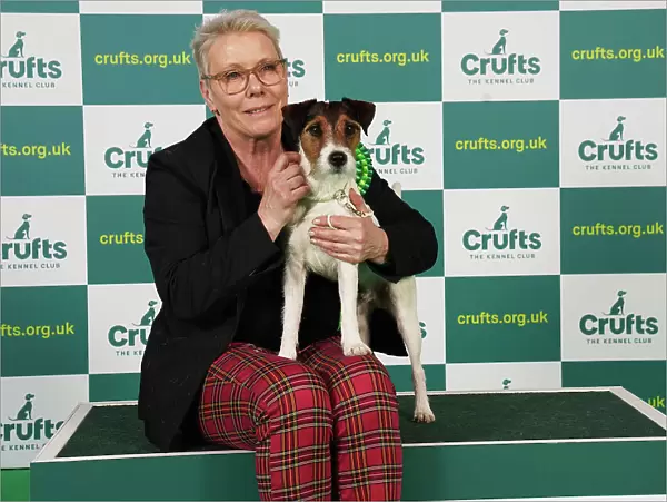 Anne Karlsson from Sweden with Scott, a Parson Russell Terrier, which was the Best of Breed winner today (Saturday 11. 03. 23), the third day of Crufts 2023, at the NEC Birmingham