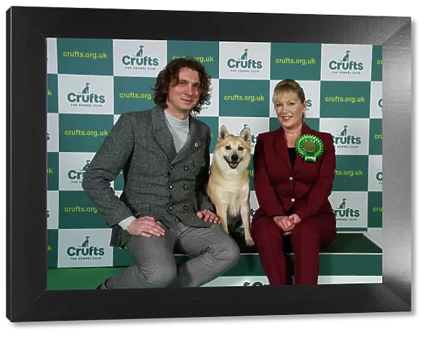 Marie Corin and Adam Camm from London with Borgen, a Norwegian Buhund, which was the Best of Breed winner today (Friday 10. 03. 23), the second day of Crufts 2023, at the NEC Birmingham