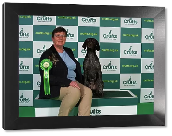 Nikki Steward from Renfrew with Movern, a German Shorthaired Pointer, which was the Best of Breed winner today (Thursday 09. 03. 23), the first day of Crufts 2023, at the NEC Birmingham