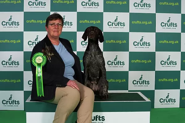 Nikki Steward from Renfrew with Movern, a German Shorthaired Pointer, which was the Best of Breed winner today (Thursday 09. 03. 23), the first day of Crufts 2023, at the NEC Birmingham