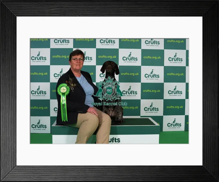 Framed Print : Nikki Steward from Renfrew with Movern, a German Shorthaired Pointer, which was the Best of Breed winner today (Thursday 09. 03. 23), the first day of Crufts 2023, at the NEC Birmingham