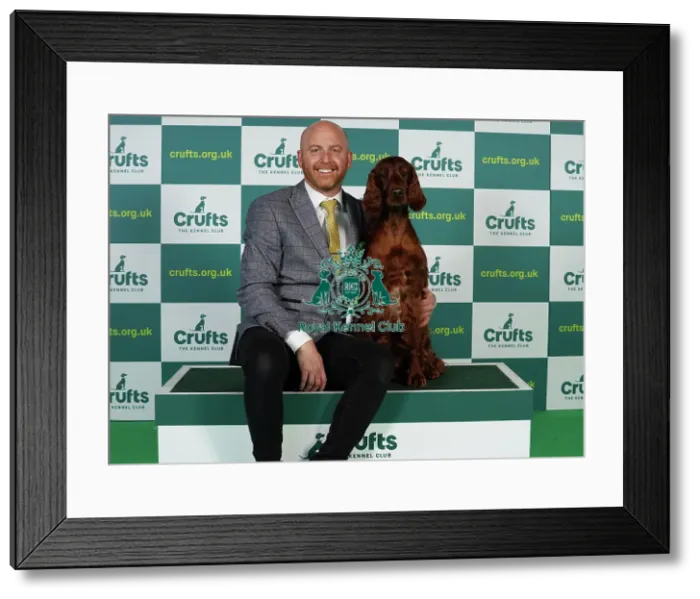 Framed Print : Blake Crocker from Somerset with Gloria, an Irish Setter, which was the Best of Breed winner today (Thursday 09. 03. 23), the first day of Crufts 2023, at the NEC Birmingham Framed Print : Blake Crocker from Somerset with Gloria, an Irish Setter, which was the Best of Breed winner today (Thursday 09. 03. 23), the first day of Crufts 2023, at the NEC Birmingham