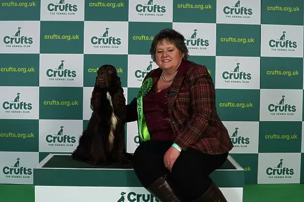 Gretel Osborn from Aylesbury with Esther, a Field Spaniel, which was the Best of Breed winner today (Thursday 09. 03. 23), the first day of Crufts 2023, at the NEC Birmingham