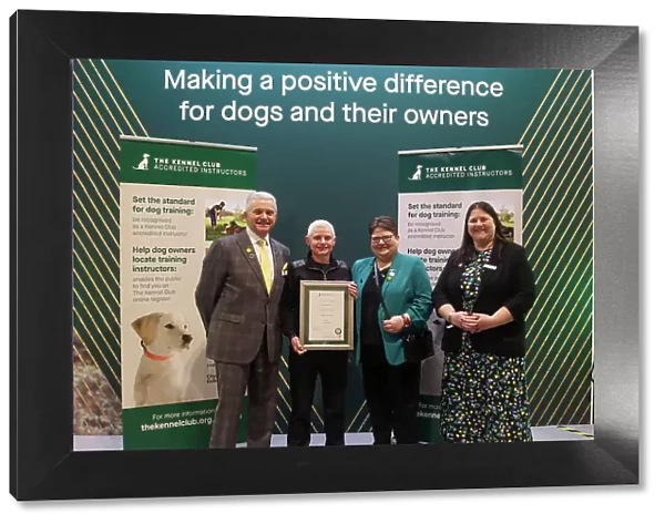Diane Martin receiving her KCAI certificate for Companion Dog Training with Paul Rawlings, Helen Kerfoot and Angela White, KCAI Vice Chair