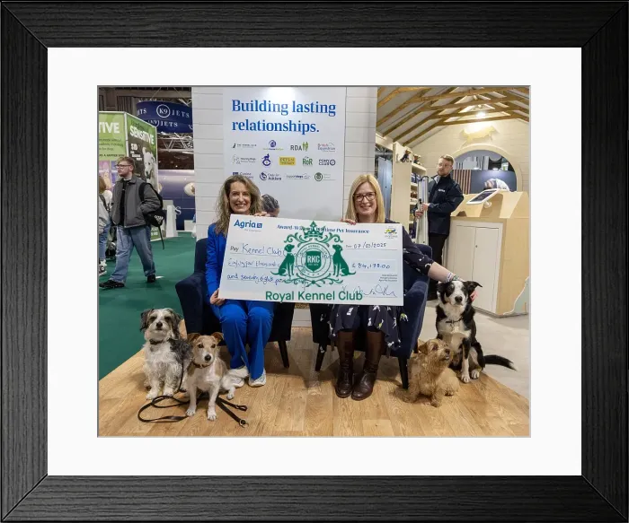 Framed Print : Jennifer Millard - Chair of the Kennel Club Charitable Trust is presented by with a cheque by Vicki Wentworth CEO AGRI