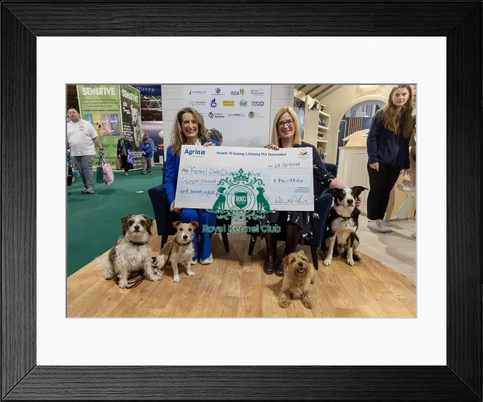 Framed Print : Jennifer Millard - Chair of the Kennel Club Charitable Trust is presented by with a cheque by Vicki Wentworth CEO AGRI