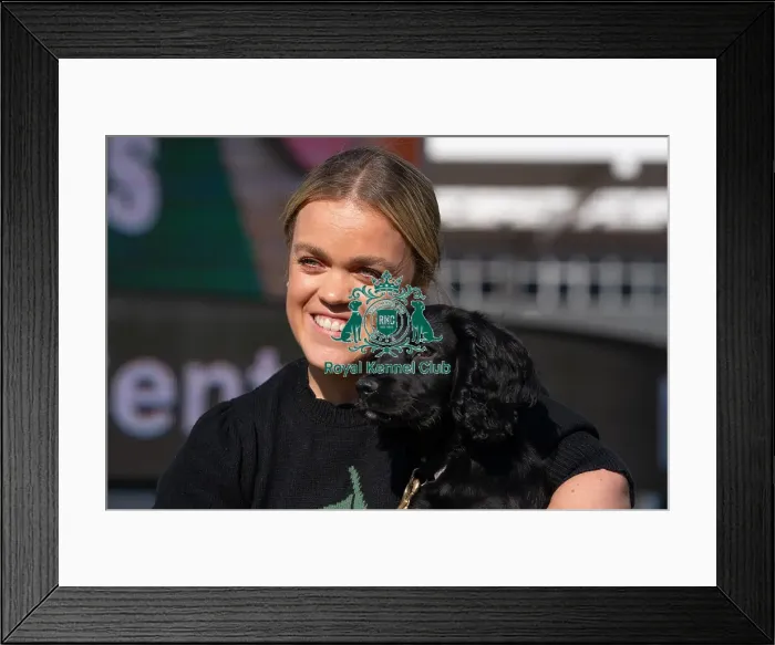 Framed Print : Paralympian Ellie Simmonds with Cocker Spaniel puppy Kipling at the launch of Crufts 2025