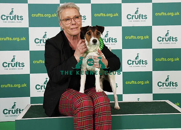 Anne Karlsson from Sweden with Scott, a Parson Russell Terrier, which was the Best of Breed winner today (Saturday 11. 03. 23), the third day of Crufts 2023, at the NEC Birmingham