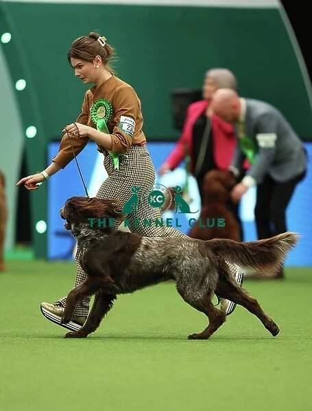 Annemiek Vanroon and Sophie Roels from Holland with Jack, a German Longhaired Pointer, which was the Best of Breed winner today (Thursday 09. 03. 23), the first day of Crufts 2023, at the NEC Birmingham