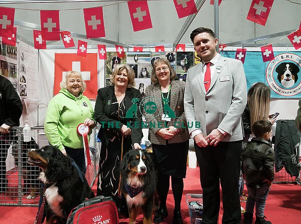 The Bernese Mountain Dog Club being awarded the Best Discover Dogs Stand for the Working Group at Crufts on Sunday 10th March 2024 by Alison Scutcher, Nicky Ackerley-Kemp (Directors at The Kennel Club) and Ricky Furnell from Royal Canin