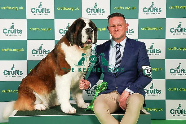 Brendan Deegan from Lincolnshire with Mandie, a St. Bernard, which was the Best of Breed winner today (Friday 10. 03. 23), the second day of Crufts 2023, at the NEC Birmingham. Brendan Deegan from Lincolnshire with Mandie, a St
