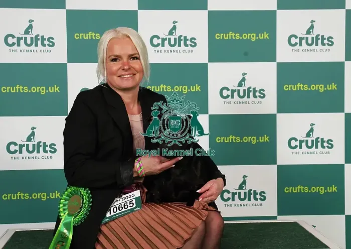 Framed Print : Catrine Arntzen from Norway with Lea, a Staffordshire Bull Terrier, which was the Best of Breed winner today (Saturday 11. 03. 23), the third day of Crufts 2023, at the NEC Birmingham