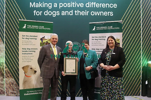Diane Martin receiving her KCAI certificate for Companion Dog Training with Paul Rawlings, Helen Kerfoot and Angela White, KCAI Vice Chair