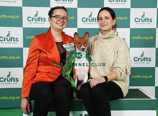 Dorata and Marter Muller from Poland with Poppy, a Basenji, which was the Best of Breed winner today (Saturday 11. 03. 23), the third day of Crufts 2023, at the NEC Birmingham