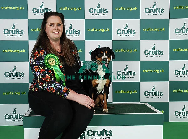 Emily English from Derby with Betty, an Entlebucher Mountain Dog, which was the Best of Breed winner today (Friday 10. 03. 23), the second day of Crufts 2023, at the NEC Birmingham