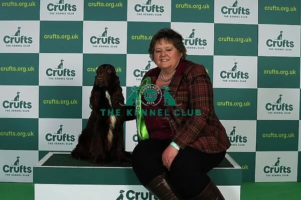Gretel Osborn from Aylesbury with Esther, a Field Spaniel, which was the Best of Breed winner today (Thursday 09. 03. 23), the first day of Crufts 2023, at the NEC Birmingham