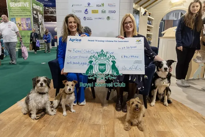 Framed Print : Jennifer Millard - Chair of the Kennel Club Charitable Trust is presented by with a cheque by Vicki Wentworth CEO AGRI