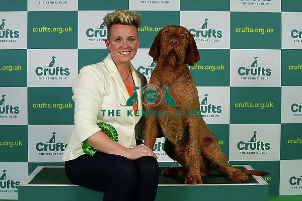 Jo Lumasia from Lanark with Nacho, a Wirehaired Vizsla, which was the Best of Breed winner today (Thursday 09. 03. 23), the first day of Crufts 2023, at the NEC Birmingham