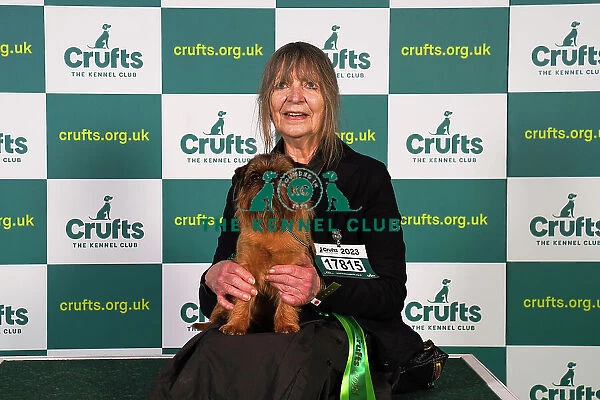 Joan Martyn, from Stockbridge, with Arthur, a Griffon Bruxellois, which was the Best of Breed winner today (Sunday 12. 03. 23), the last day of Crufts 2023, at the NEC Birmingham