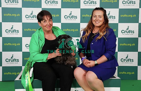 Karen and Caitlin Forbes from Garmouth with Houska, a Cesky Terrier, which was the Best of Breed winner today (Saturday 11. 03. 23), the third day of Crufts 2023, at the NEC Birmingham