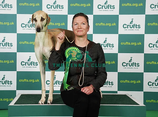 Katia Schroder from Germany with Ubatda, a Sloughi, which was the Best of Breed winner today (Saturday 11. 03. 23), the third day of Crufts 2023, at the NEC Birmingham