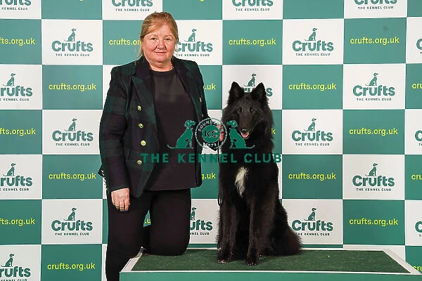 Linda Lester from Cheltenham with Envy, a Belgian Shepherd Dog (Groenendael), which was the Best of Breed winner today (Friday 10. 03. 23), the second day of Crufts 2023, at the NEC Birmingham