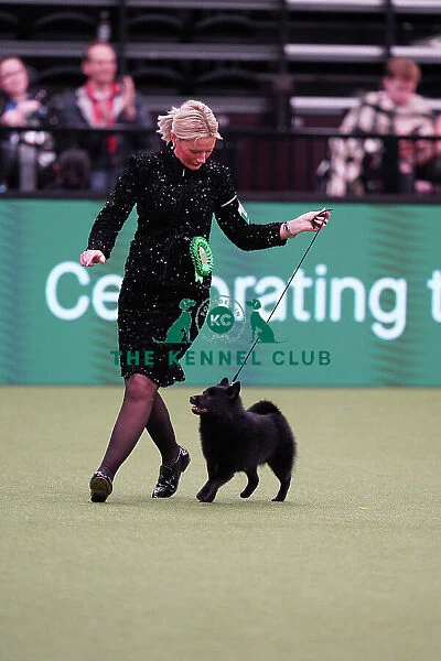 Lindsey McLachlan and Joanne McLachlan from The Wirral, with Stellon, a Schipperke, which was the Best of Breed winner today (Sunday 12. 03. 23), the last day of Crufts 2023, at the NEC Birmingham