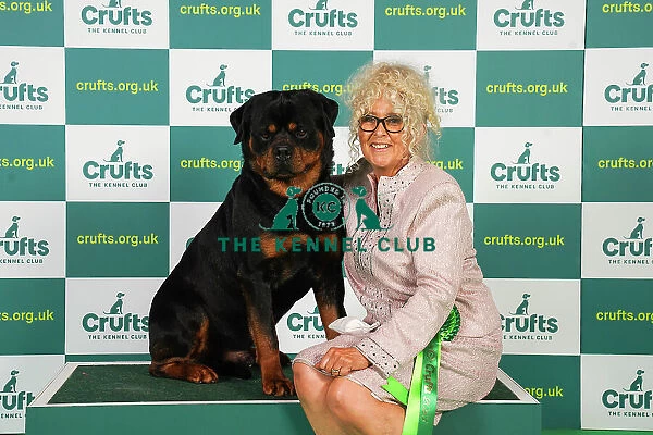 Liz Dunhill from Clumber Park with Dutch, a Rottweiler, which was the Best of Breed winner today (Friday 10. 03. 23), the second day of Crufts 2023, at the NEC Birmingham