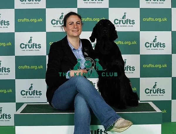Ludovica Soresina from Italy with Chilkoot, a Retriever Flat Coated, which was the Best of Breed winner today (Thursday 09. 03. 23), the first day of Crufts 2023, at the NEC Birmingham