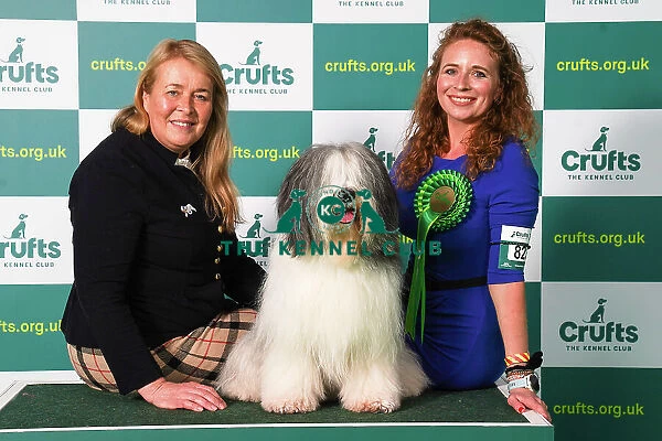 Maggie Maciagiewkz and Ula Staszczyk from USA and Poland, with Szyszka, a Polish Lowland Sheepdog, which was the Best of Breed winner today (Friday 10. 03. 23), the second day of Crufts 2023, at the NEC Birmingham