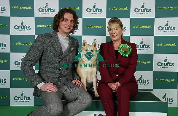 Marie Corin and Adam Camm from London with Borgen, a Norwegian Buhund, which was the Best of Breed winner today (Friday 10. 03. 23), the second day of Crufts 2023, at the NEC Birmingham