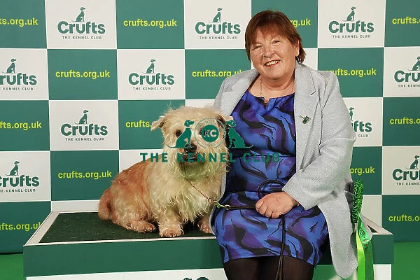Marie McNally from Wexford with Karma, a Glen of Imaal Terrier, which was the Best of Breed winner today (Saturday 11. 03. 23), the third day of Crufts 2023, at the NEC Birmingham