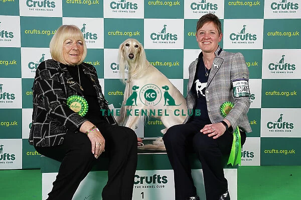 Michelle Ulyatt and Linda Aldous from Bexhill on Sea with Storm a Saluki, which was the Best of Breed winner today (Saturday 11. 03. 23), the third day of Crufts 2023, at the NEC Birmingham