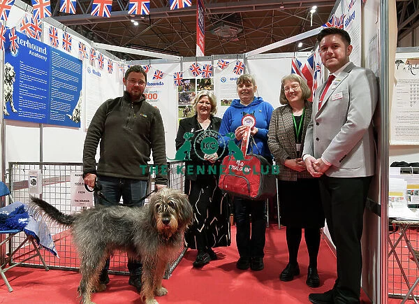 The Otterhound Club being awarded the Best Discover Dogs Stand for the Hound Group at Crufts on Sunday 10th March 2024 by Alison Scutcher, Nicky Ackerley-Kemp (Directors at The Kennel Club) and Ricky Furnell from Royal Canin