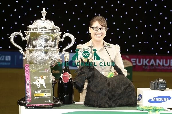 Rebecca Cross from Geithsburg, PA, USA with Kanopa a Scottish Terrier, which won